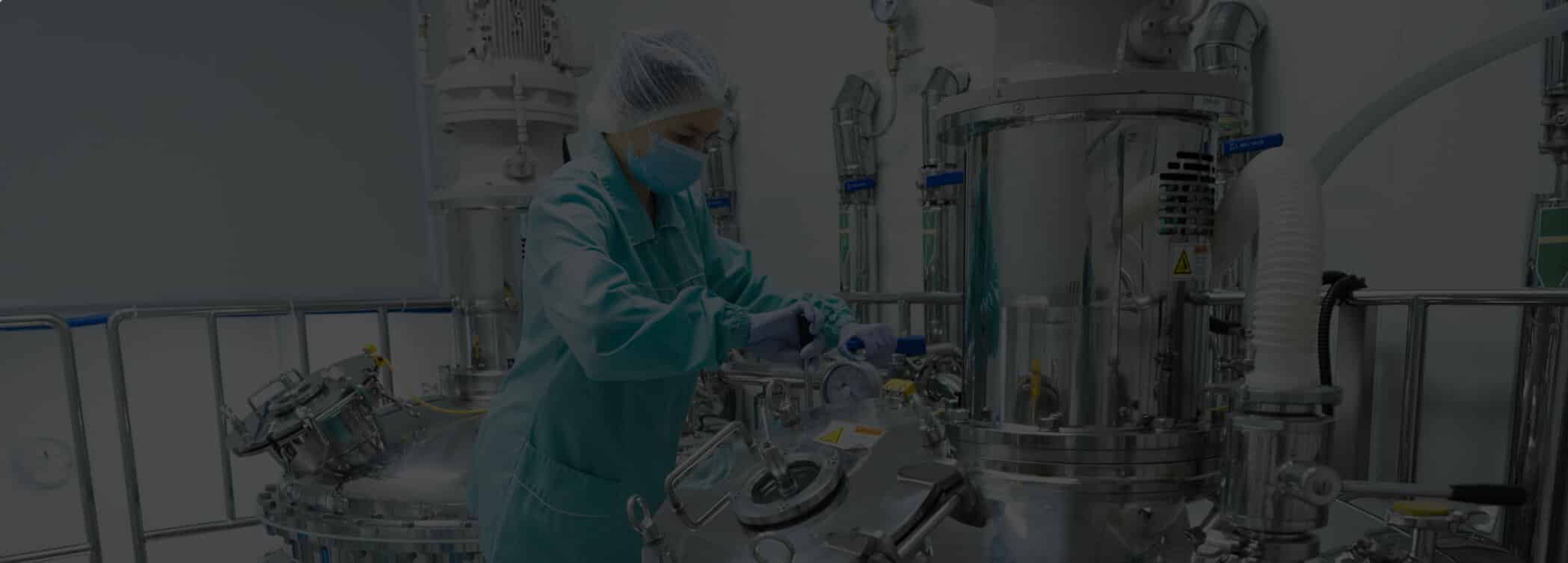 Medical Industry Plating - A worker in a protective suit