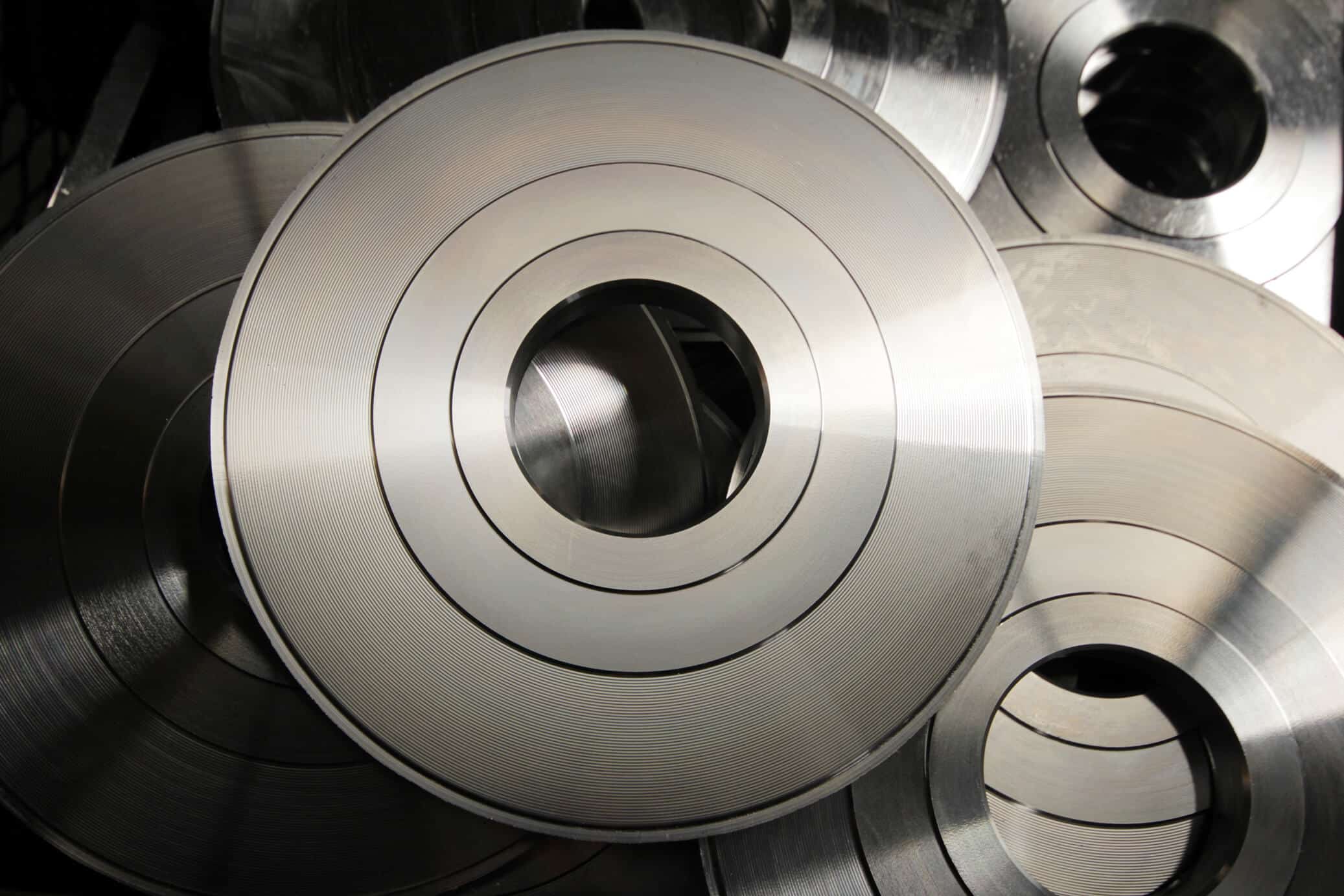 Carbon Steel Electroplating - some round components laid out on top of each other